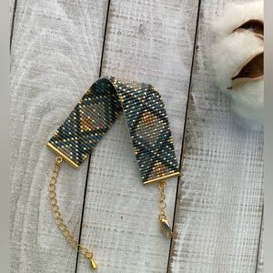 ISIDA handmade beaded loom bracelet with adjustable closure